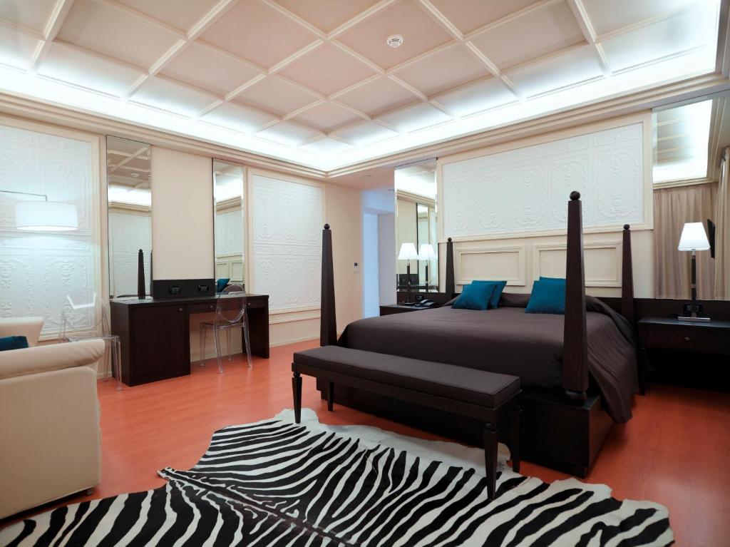 Junior Suite Superior con Vista Lago (3 Adulti)
